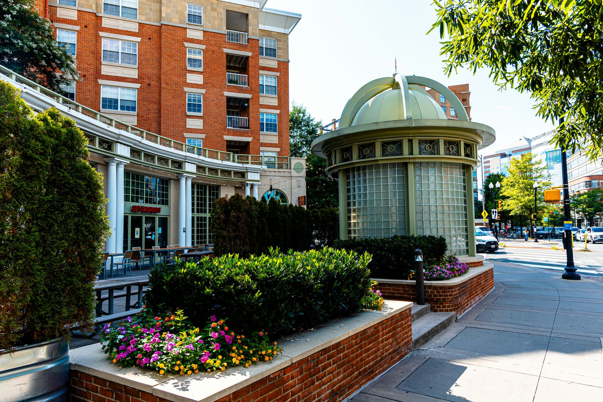 A building with a green dome on top of it