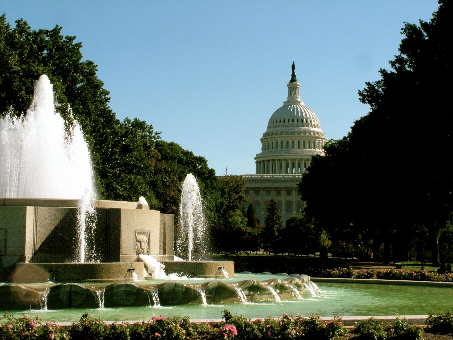 A stunning image of the US Capitol building with a foreground fountain in Washington D.C.