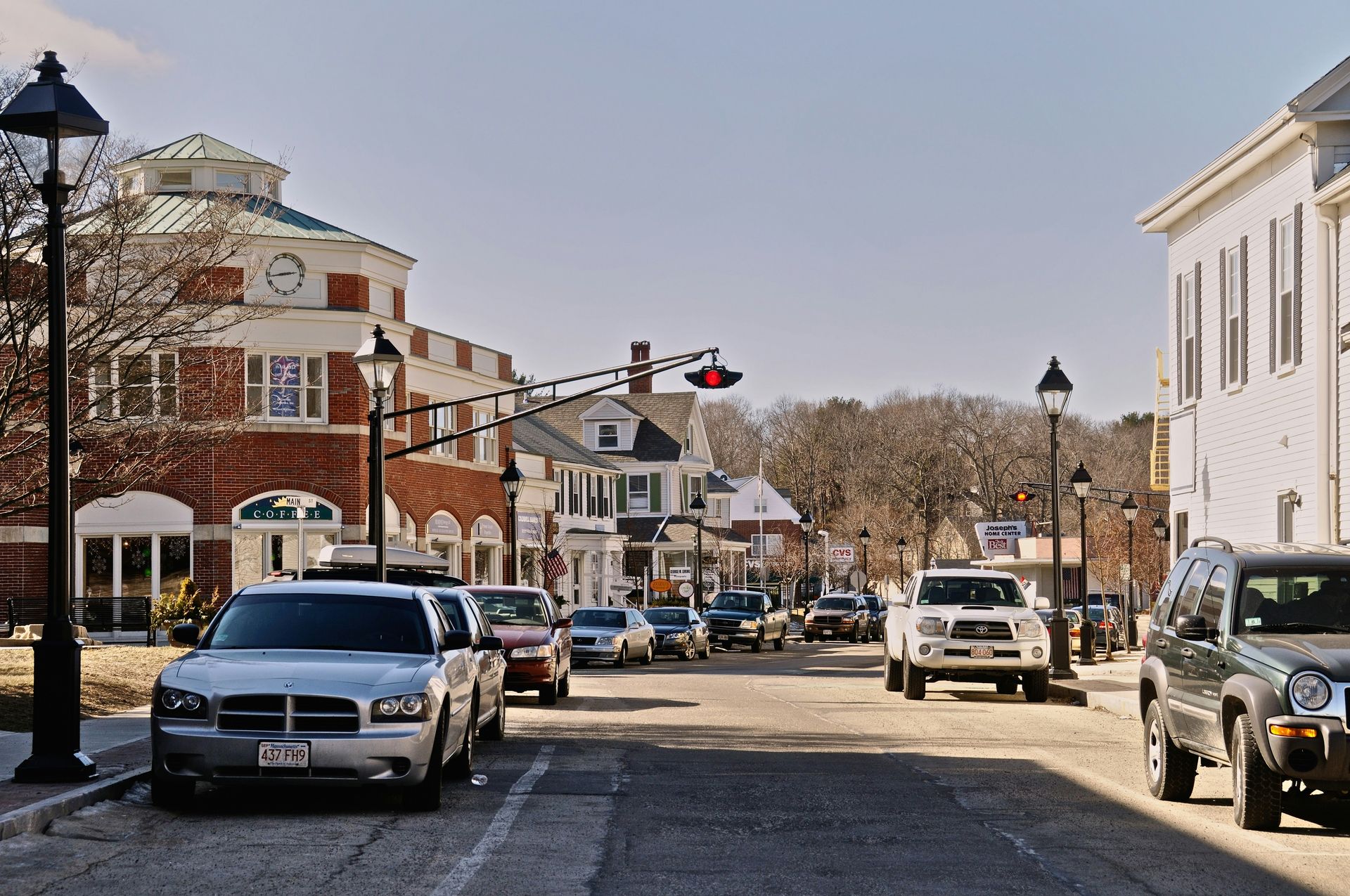 cars parked on the side of the road during daytime